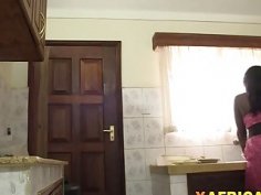 African babe with big tits gets banged in kitchen