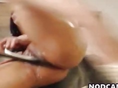 Oiled asian fucks pussy fingerin